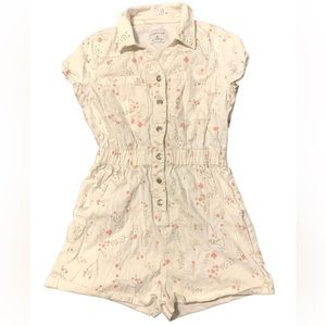 Cream romper size M.